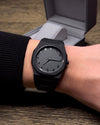 Premium black stainless steel watch worn on a man's wrist, perfect for a bold and modern look - Zalviro