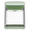 Sleek front-facing profile perspective detailing the high-capacity shatterproof transparent collection base beneath the secure mint-colored chopping platform precision engineered by Zalviro.