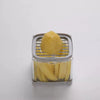 Top-down macro perspective highlighting perfect symmetrical alignment of raw ingredients resting flat against the razor-sharp cross-grid matrix wires of the ultimate Zalviro slicing tool.