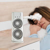 "Ultra-quiet cooling fan with dual spray nozzles being used by a sleeping child, ensuring a peaceful and humidified atmosphere."