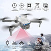 Silver E99 drone hovering steadily over a beach landscape while highlighting its multi-directional safety obstacle sensor array.