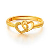 Top view of a delicate gold heart-to-heart adjustable ring - Zalviro Jewelry
